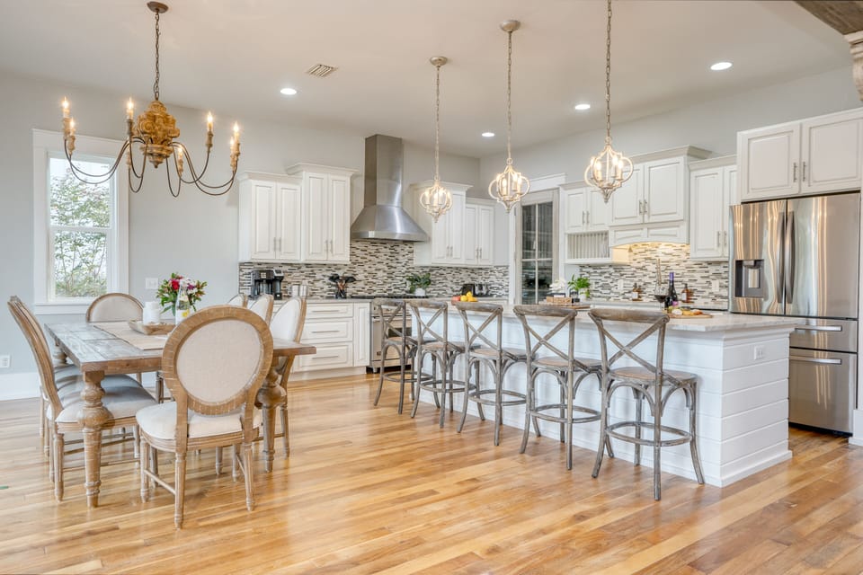Bright, open floor plan with an elevated feel and rustic accents.