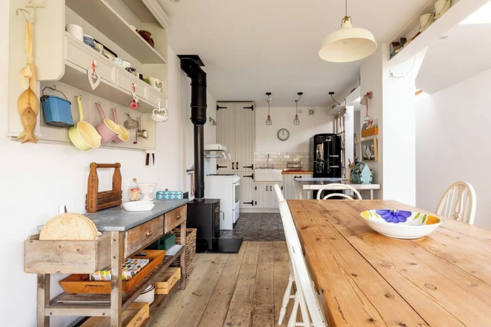 Fully equipped kitchen with log burner