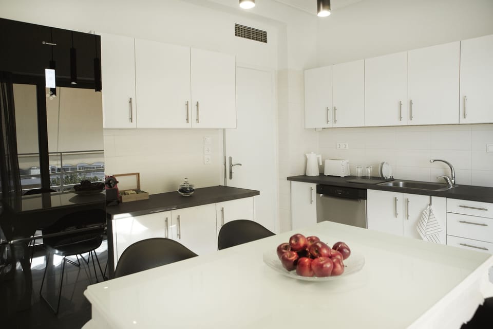 Luxury Apartment | Private kitchen | Espresso maker, coffee/tea maker, electric kettle, highchair