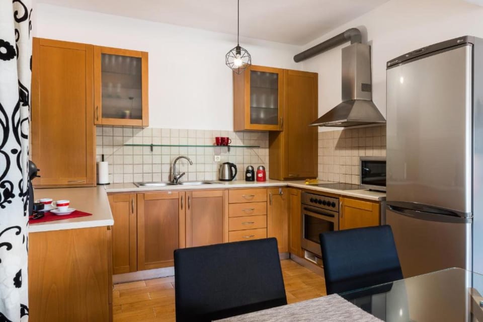 Luxury Villa | Private kitchen | Full-size fridge, microwave, oven, stovetop
