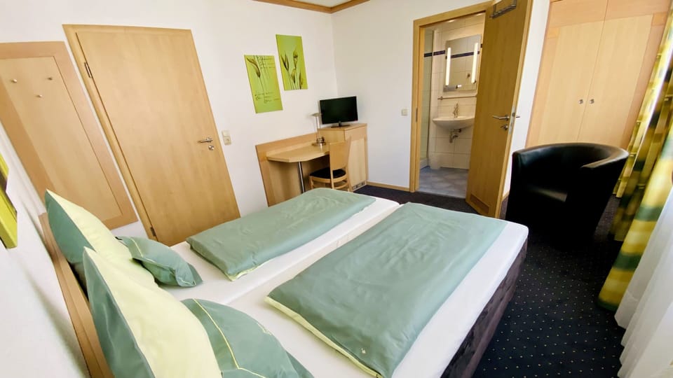 Desk, laptop workspace, free WiFi, bed sheets