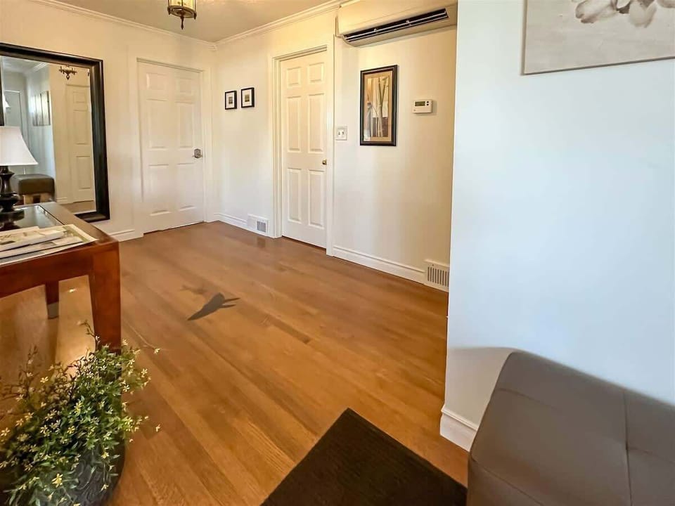 Hall with inlaid wood flooring