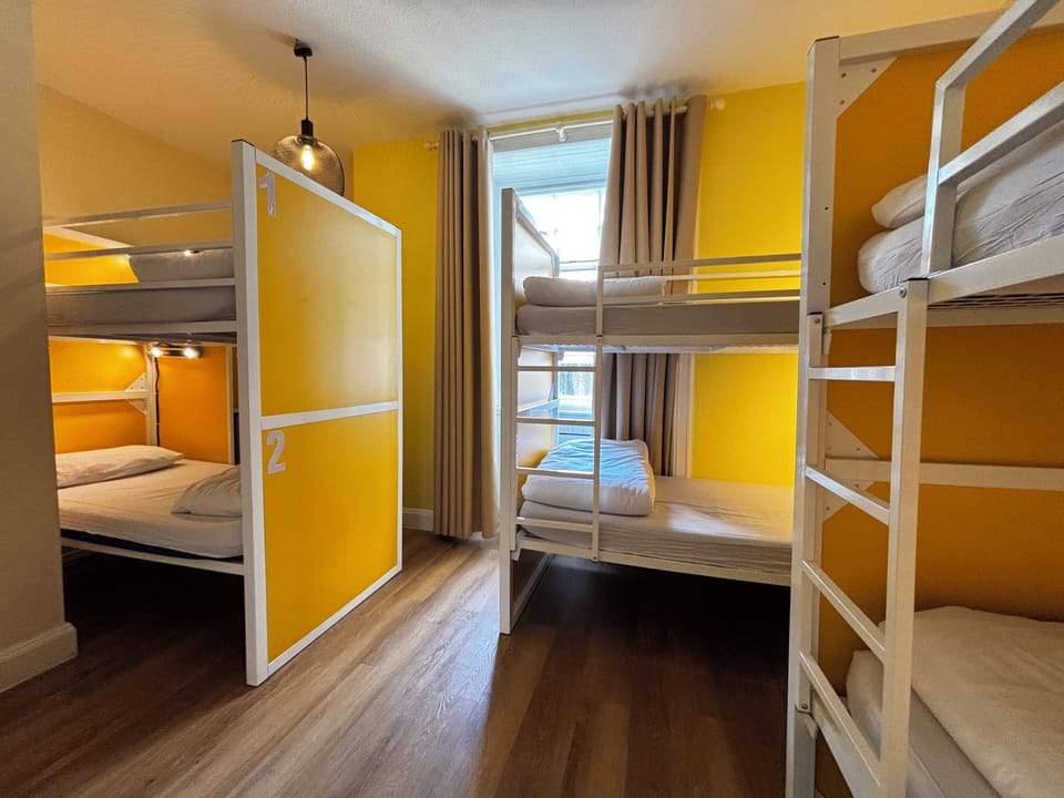 Laptop workspace, free WiFi, bed sheets