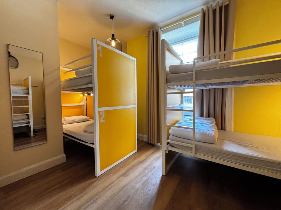 Laptop workspace, free WiFi, bed sheets