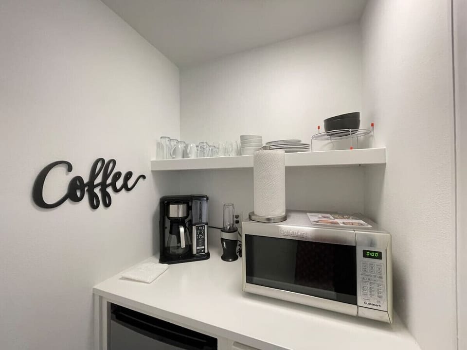 Fully equipped Efficiency Kitchen - Refrigerator, Convection Microwave, Coffee Pot, Plateware, Silverware, Hot Plate.