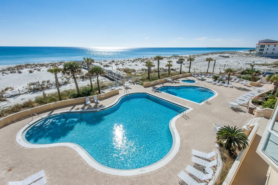 Apartment, Multiple Beds (Emerald Isle unit 406) | Pool | Outdoor pool, a heated pool