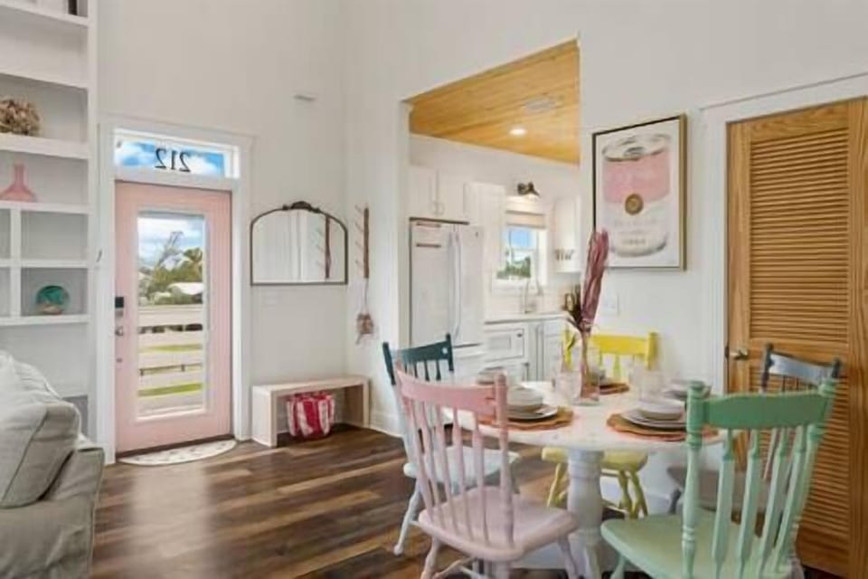 Open Space dining with custom painted chairs.