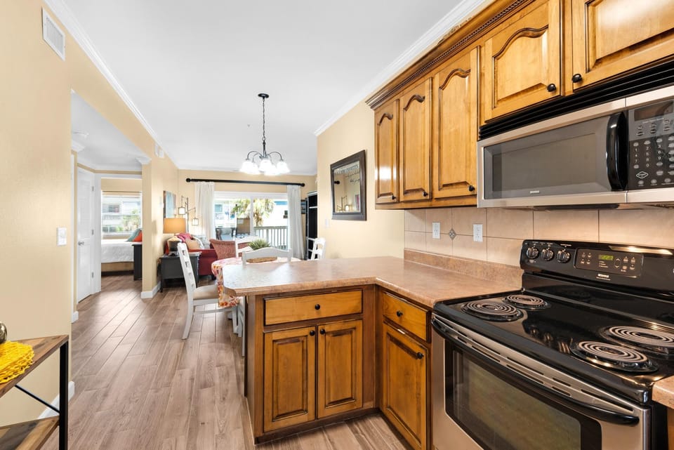 Apartment, Multiple Beds (Villas on the Gulf unit J7) | Private kitchen | Oven, toaster