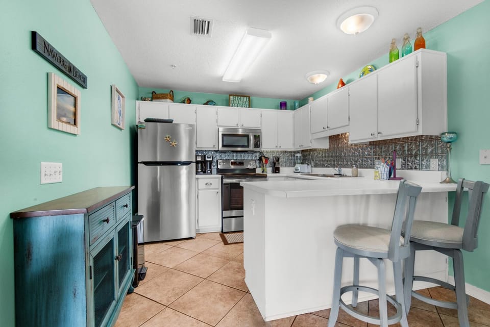 Apartment, 1 King Bed with Sofa bed (Sunset Harbor Villas 313) | Private kitchen | Oven, toaster, paper towels