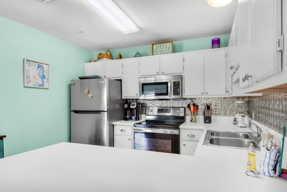 Apartment, 1 King Bed with Sofa bed (Sunset Harbor Villas 313) | Private kitchen | Oven, toaster, paper towels
