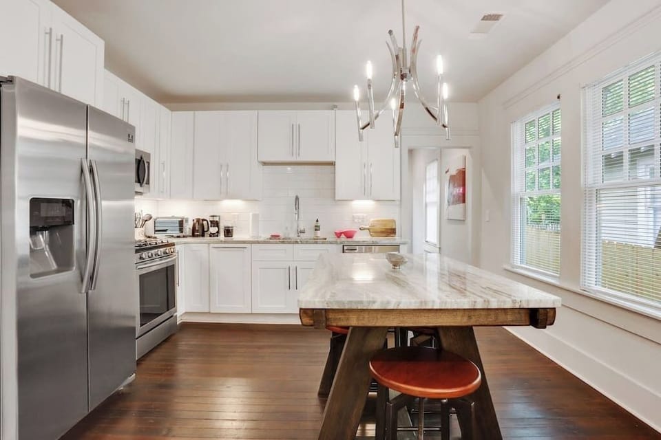Kitchen with Large Island Set Up (Dining Stools Tuck Under During the Day)
