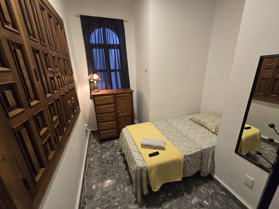 Economy Room | Blackout drapes, iron/ironing board (on request), WiFi (free)