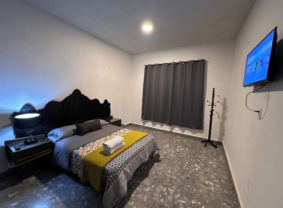 Blackout drapes, iron/ironing board (on request), WiFi (free)