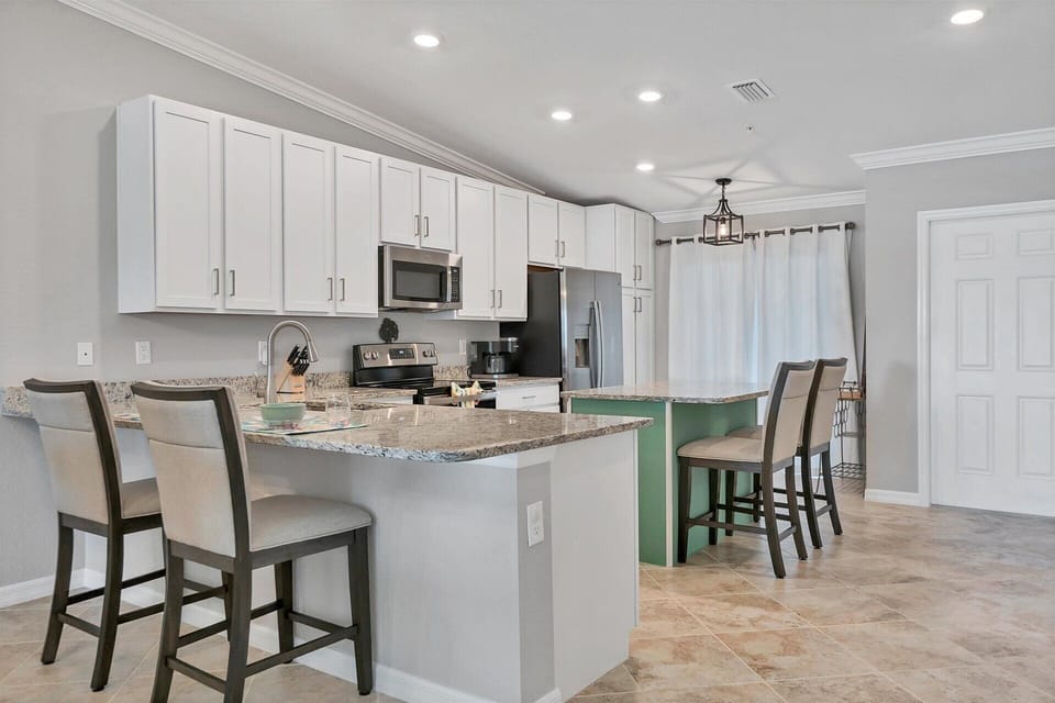 Bar stools provide 5 additional seats for dining