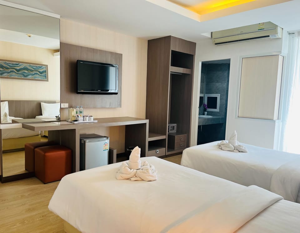 Desk, laptop workspace, free WiFi, bed sheets