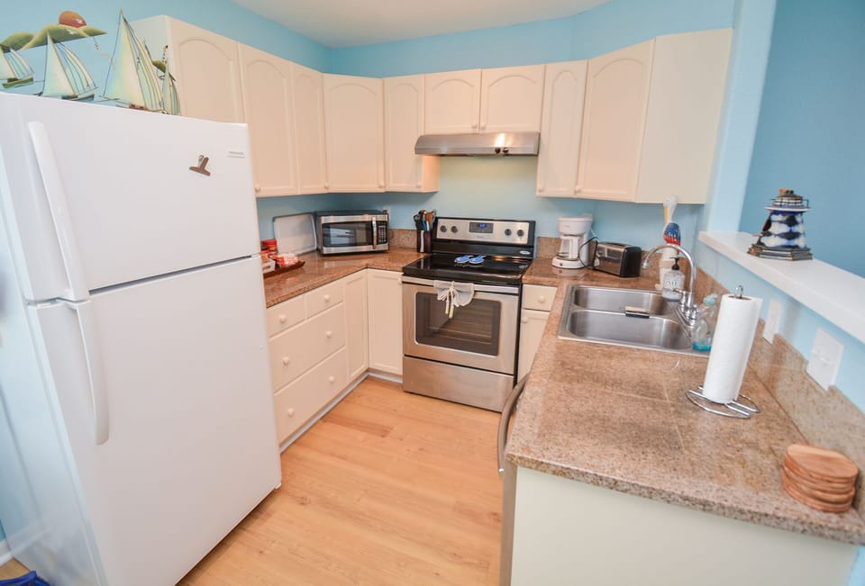 Discover culinary delights in our stylish and functional kitchen space. 🍽️✨