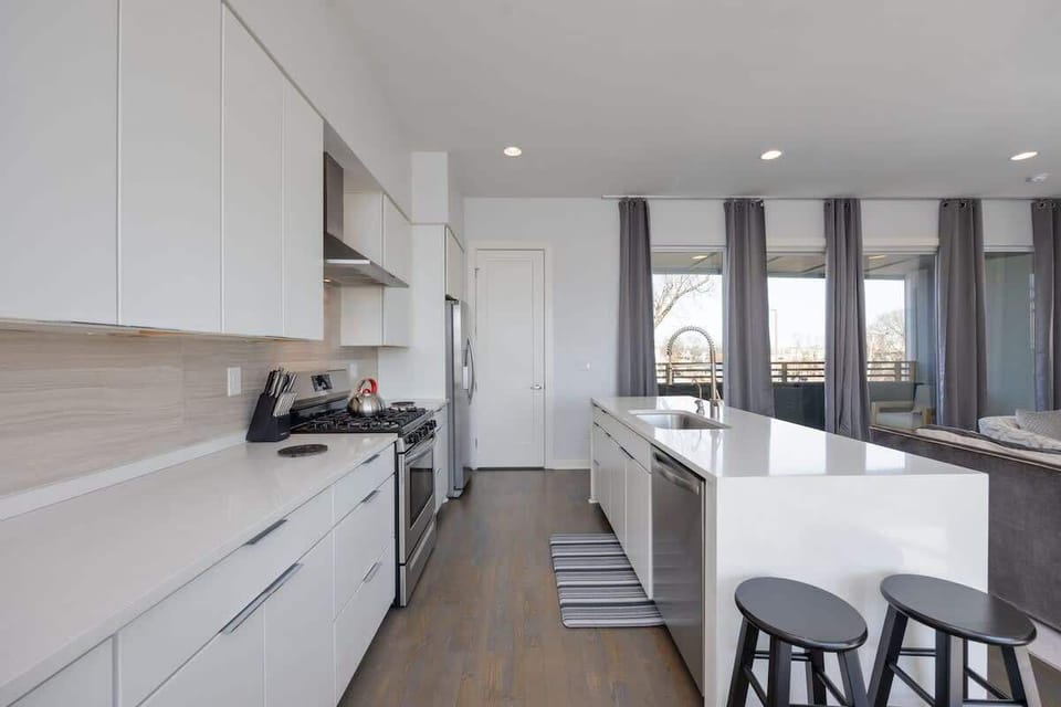Fully equipped kitchen stocked with your basic cooking essentials, stainless-steel appliances, and breakfast bar seating. (2nd Floor)