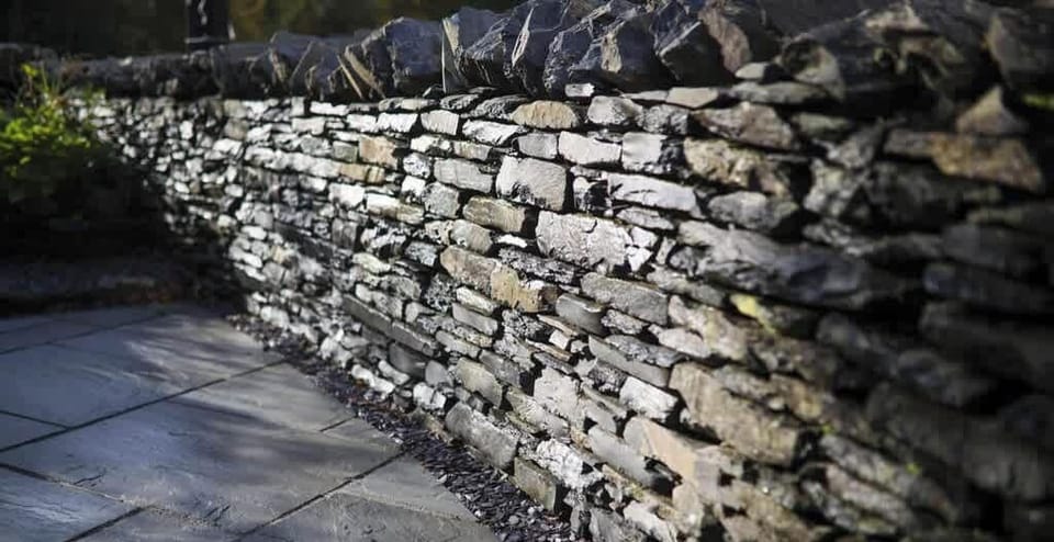 Step into the shared outdoor oasis at Fair Rigg, where historic Lakeland stone walls embrace the surroundings. Discover a charming escape, blending heritage and nature in the heart of the Lake District.