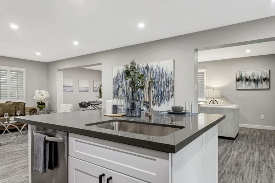 Kitchen countertop with open floorplan to the living areas