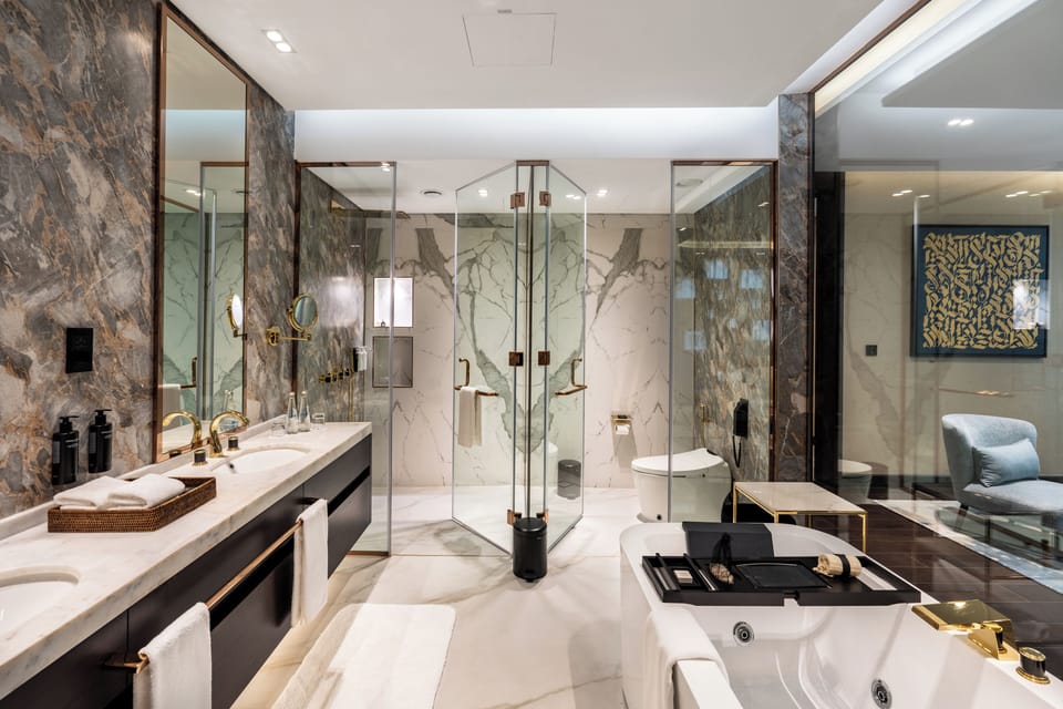 Separate tub and shower, rainfall showerhead, free toiletries