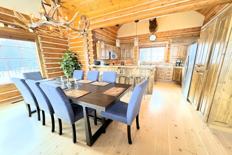 Whether you are making a meal in the kitchen, hanging around the dining table, or lounging in the living area, the open layout means no one ever has to feel left out of the fun at this home.