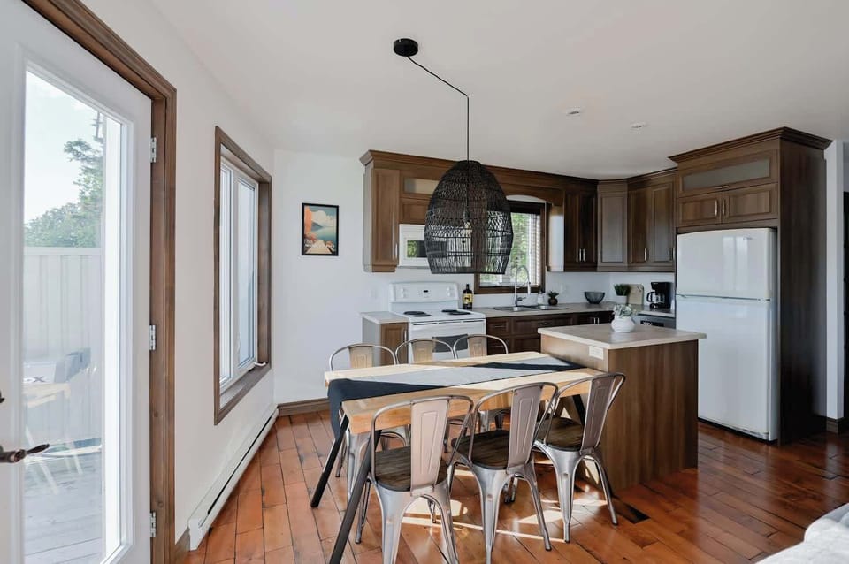 Savor meals and views from this bright, well-appointed kitchen.