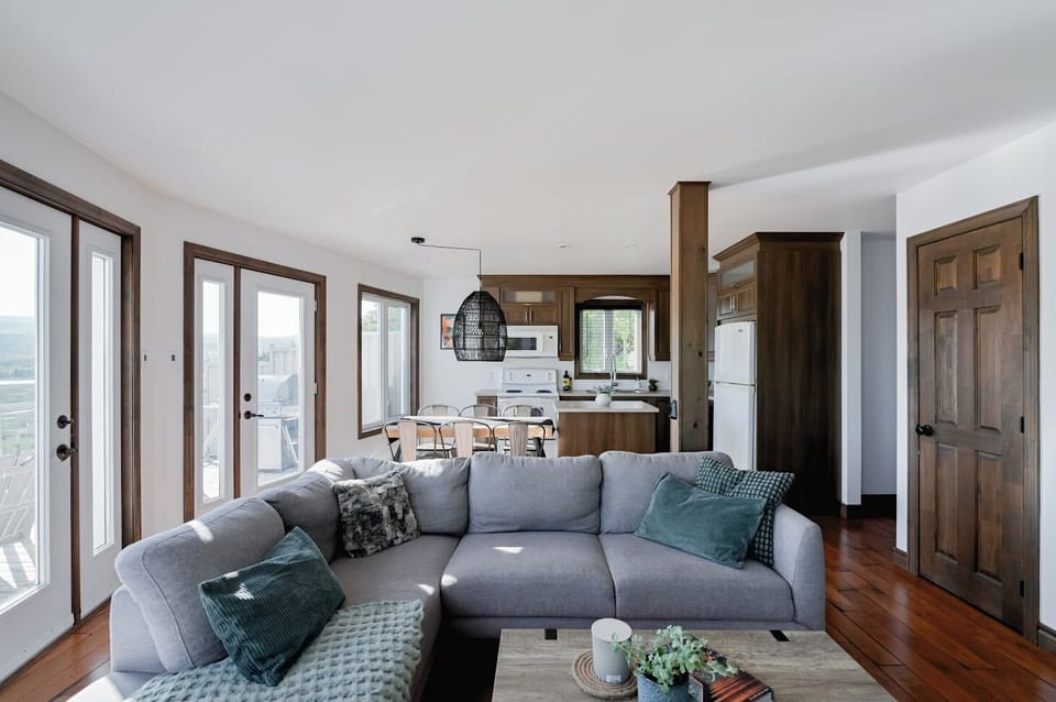 Find calm in this bright home where scenic outlooks captivate.