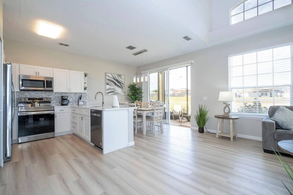 Fall in love for modern luxury with our stunning open kitchen—a beautiful, vibrant space that seamlessly combines style and functionality. a family-friendly retreat where the joy of cooking meets the warmth of togetherness.
