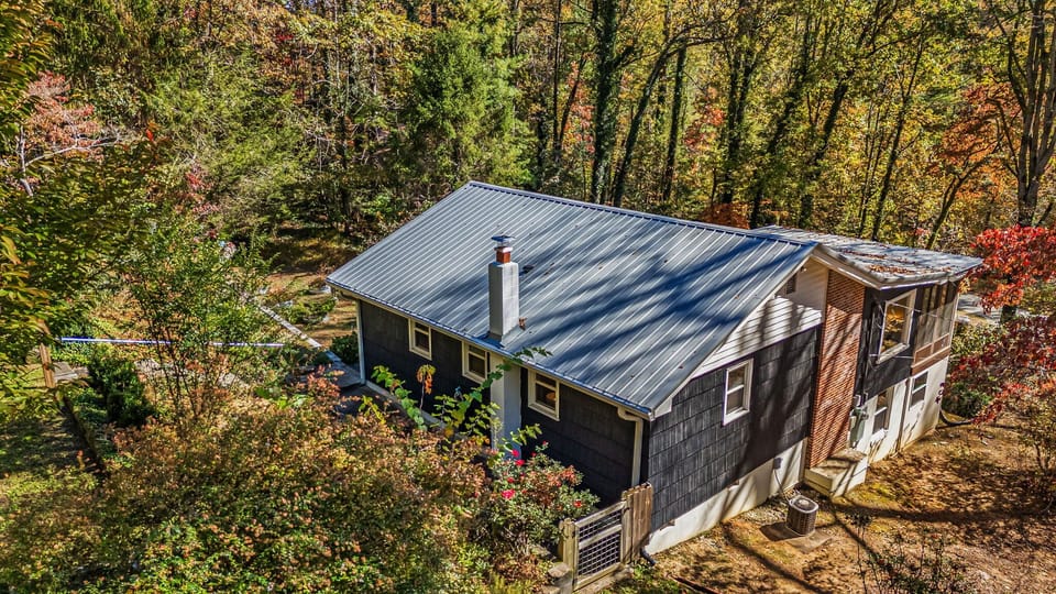 Over the line sits on 1.2 acres with lots of privacy and "mountain feel."