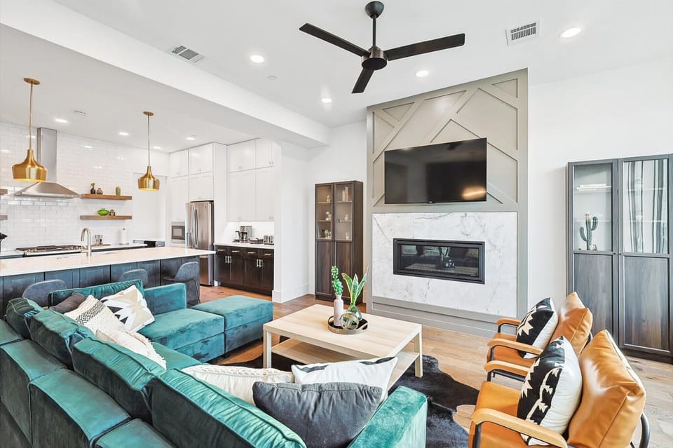 Beautifully furnished with designer furniture, this living room is modern and sleek with an air of sophistication catering to great conversation.