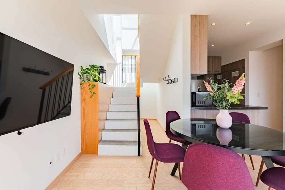 Note there are stairs inside the condo