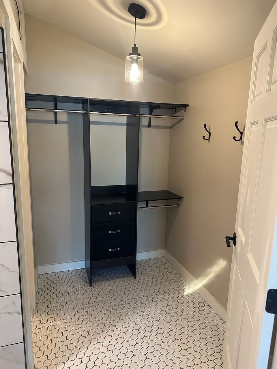 Closet Organizer System in Main Bedroom Downstairs.  
