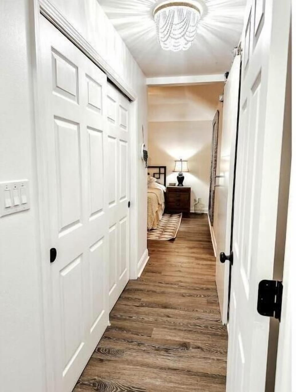 Private hallway with closet in Master bedroom 1 downstairs