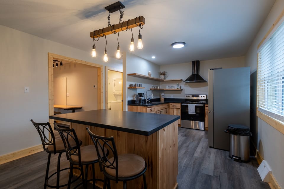 Eat in kitchen seats 3. Use height adjustable sewing chairs to seat 6!
