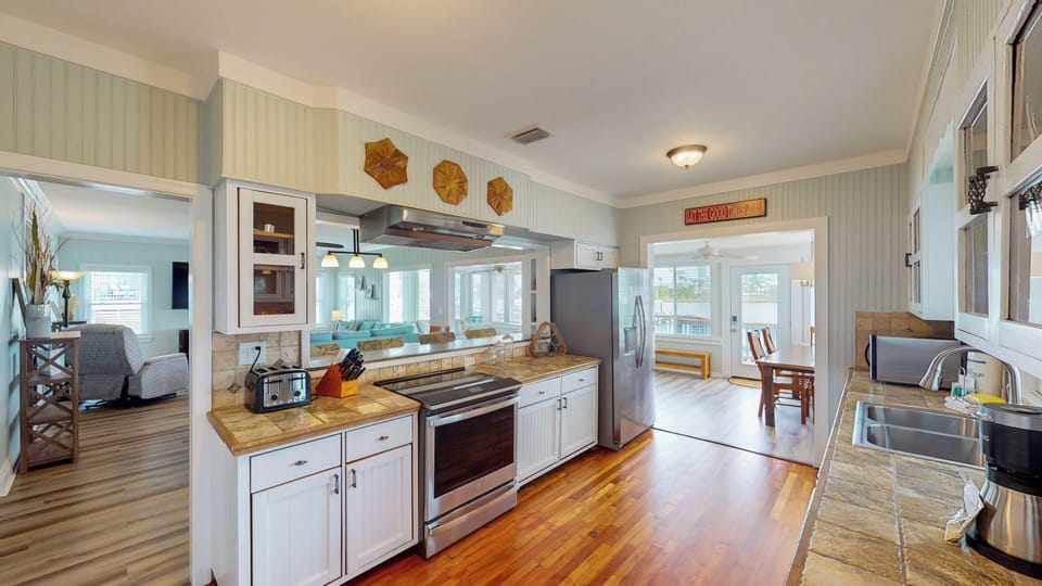 Updated stainless-steel appliances and modern conveniences make this state-of-the-art kitchen a chef's delight.