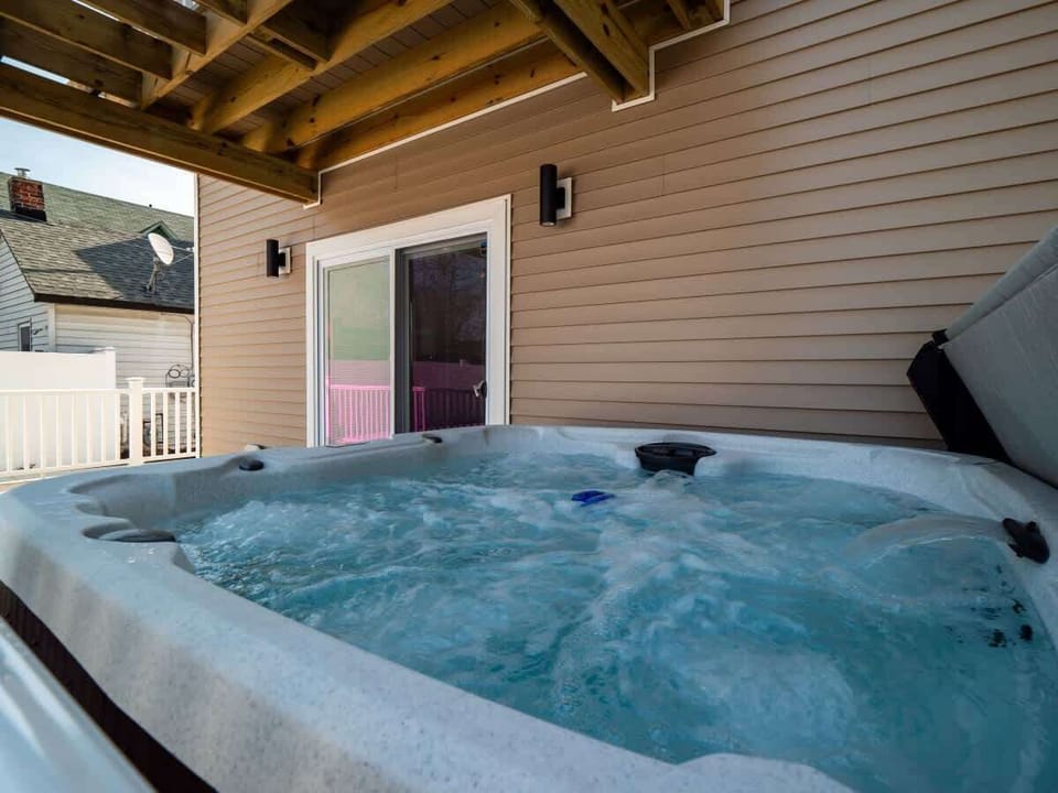 Covered hot tub area for relaxing soaks any time of day