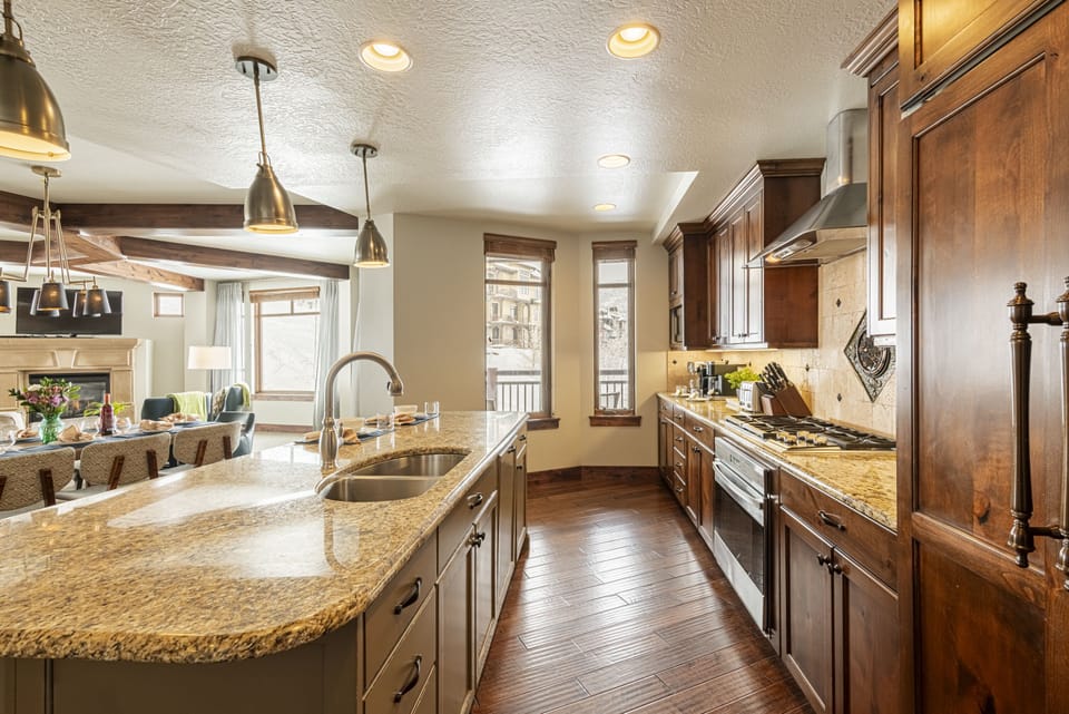 Gourmet kitchen offering a SubZero refrigerator/freezer and granite countertops