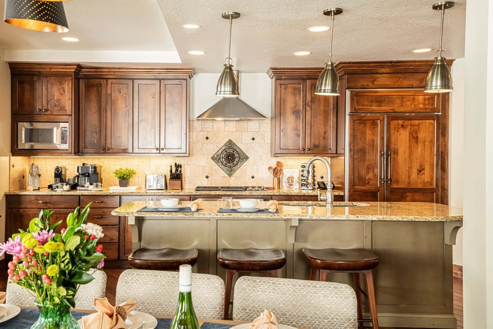 Kitchen island with bar seating for three