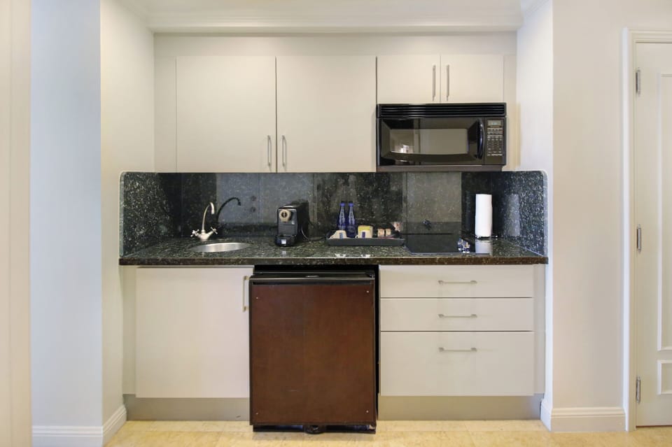 Stocked kitchen includes Lavazza coffee maker