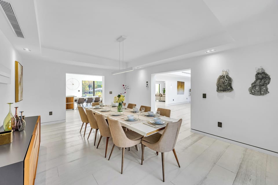 The dinning room with seating for for ten is just adjacent to the chef's kitchen.