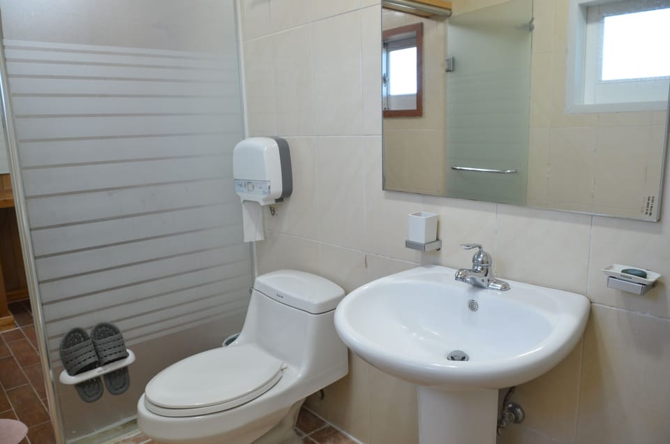Suite, Balcony, Ocean View | Bathroom | Shower, hair dryer, towels, soap