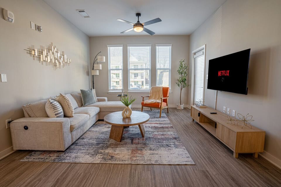 Our living room is where stylish comfort meets calming hues.