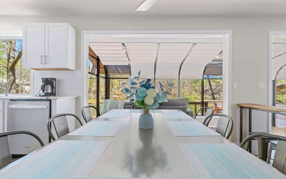  Spacious dining table with room for the whole group to gather and share meals.