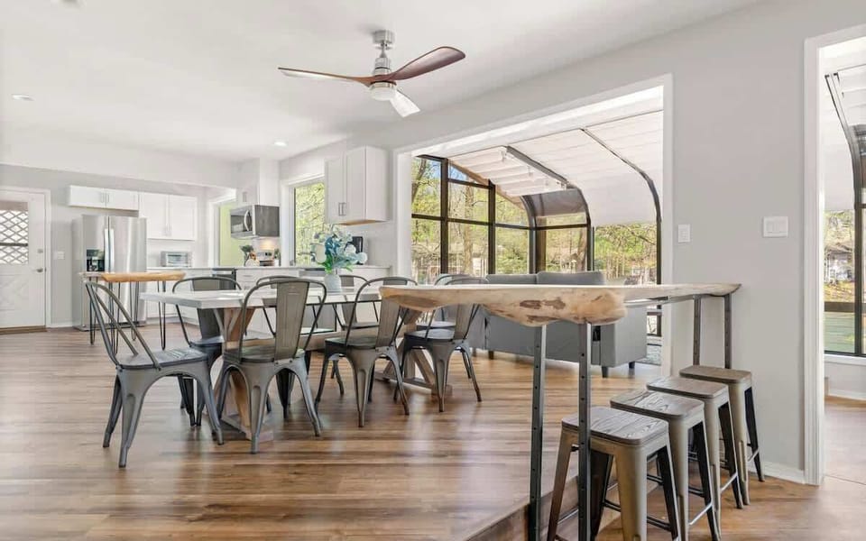 Open dining area with additional bar seating — perfect for entertaining.