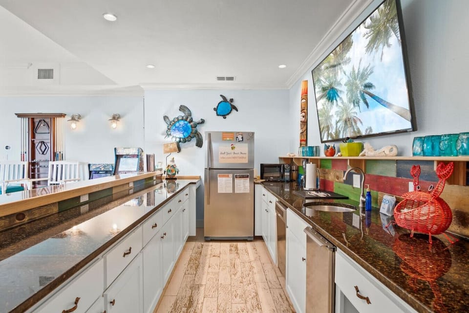 Spacious kitchen and bar area with ample counter space