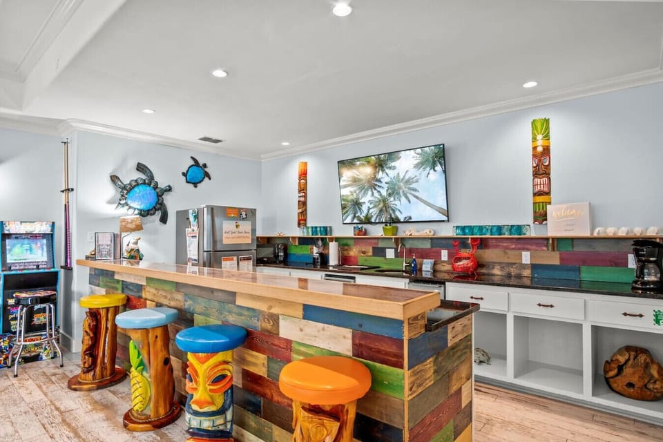Colorful ground floor kitchen and bar area