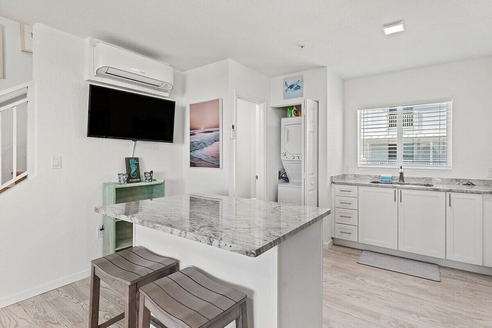 This bright and functional kitchen provides modern appliances, ample prep space, and a convenient layout for everyday vacation living in Marathon FL.