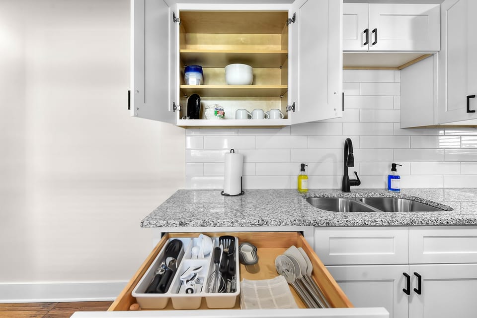 Your fully equipped kitchen features organized cabinets and drawers, making meal prep effortless during your stay.