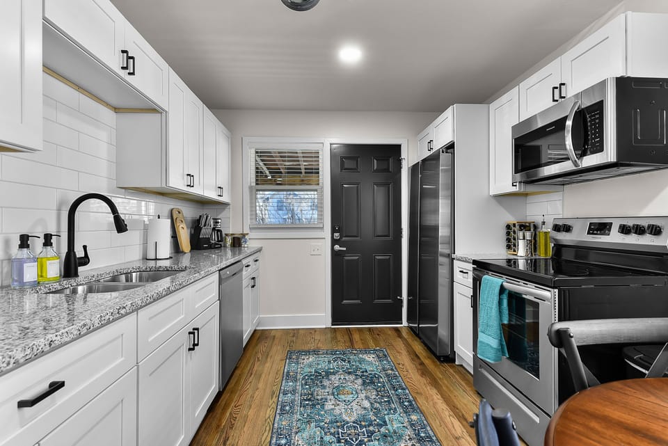 Your fully equipped kitchen awaits with granite counters, stainless appliances, and everything you need to create memorable meals during your stay.