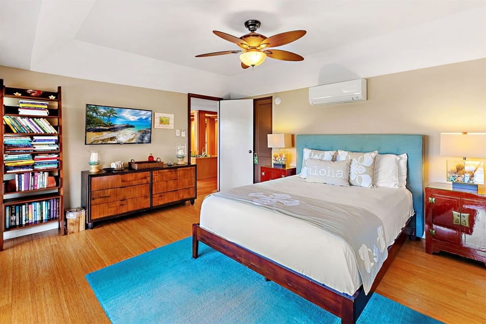 Bedroom 3 includes a queen size bed and a large picture window to take in the views.